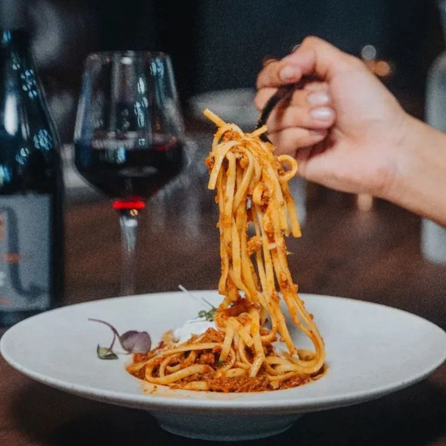 World Pasta Day at Elements Brasserie Belmore: pasta with ragout and a glass of red
